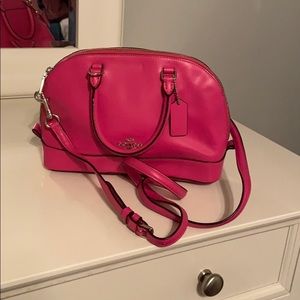Bright pink Coach purse
